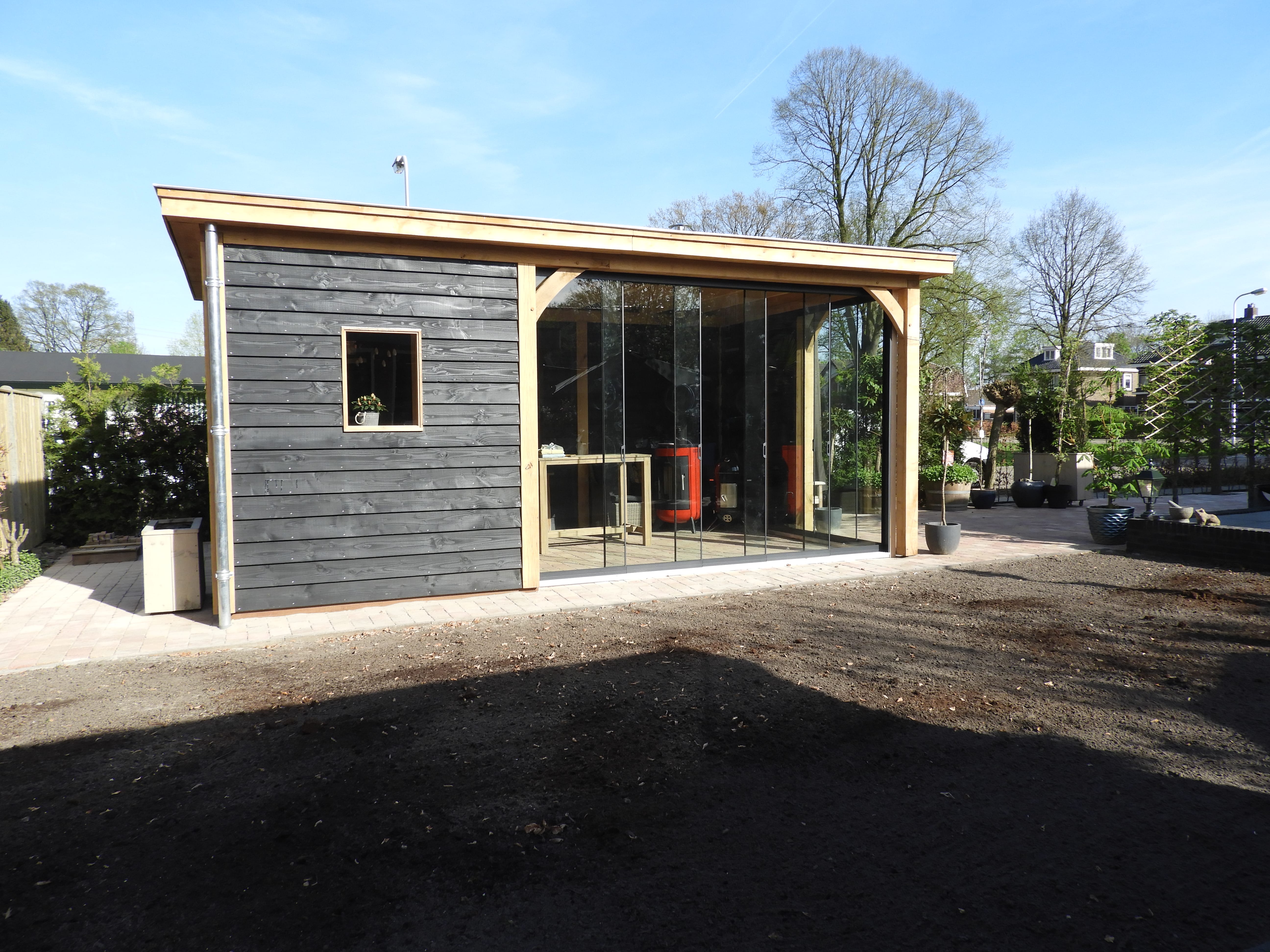 houten tuinkamer met glazen schuifwanden Vechtdalbouwsystemen